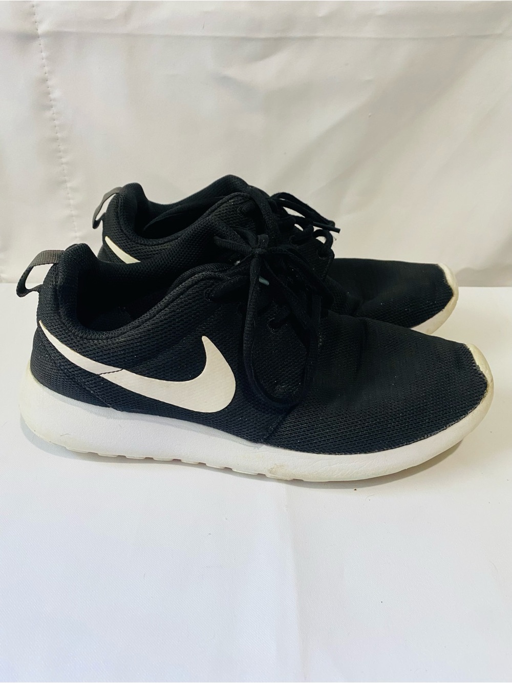 Nike Womens  Black Sneakers with White Swoosh
